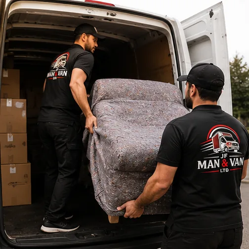 JF Man and Van movers carrying a wrapped sofa into a removals van